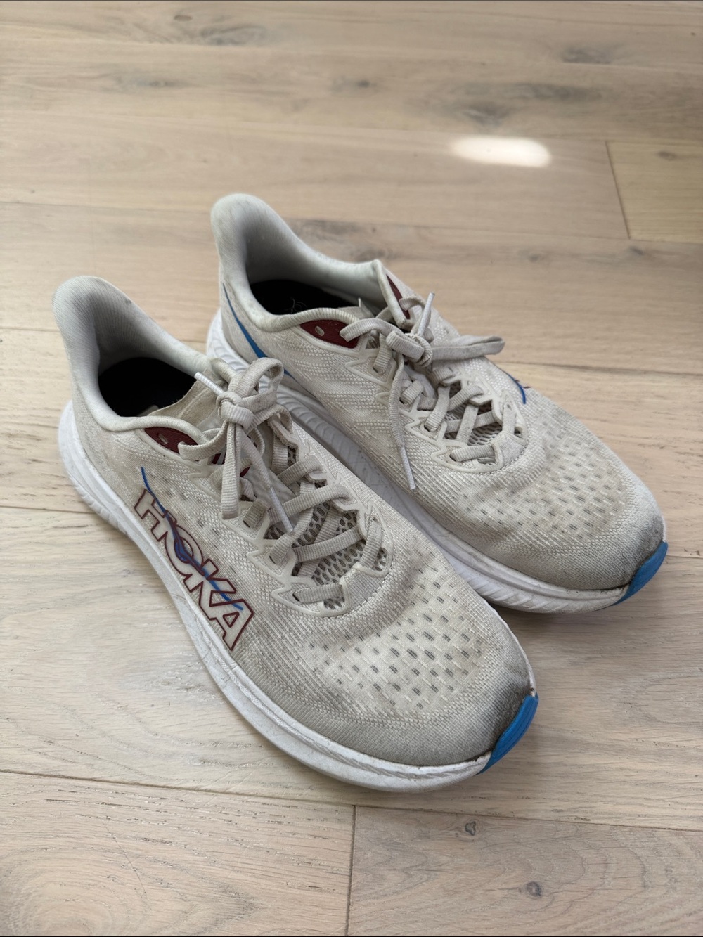 Hoka Cream Mach 6 Running Shoes with Blue and Red Accents